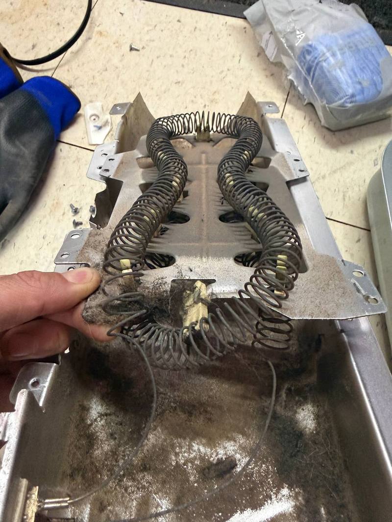 Dryer heating element — burned coils replaced